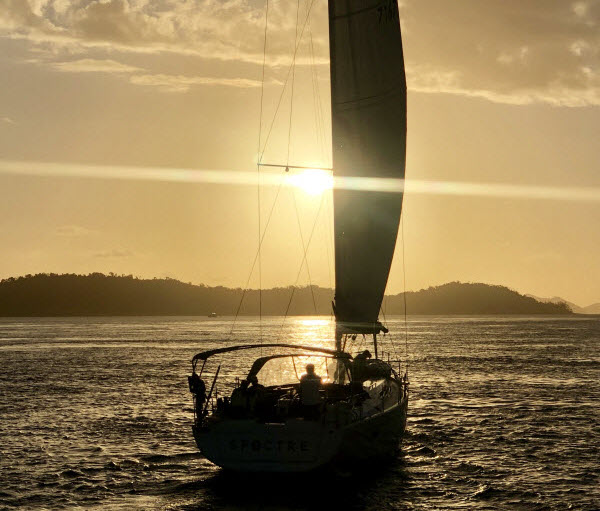 Silhouette shot of a boat with sunlight